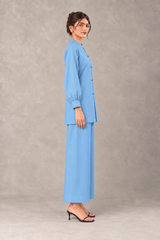 Side view of sky blue linen outfit with straight-cut shirt
