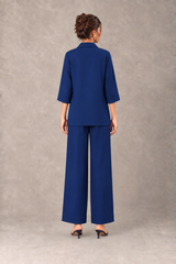 Back view of Indigo linen 2-piece with wide-leg trousers