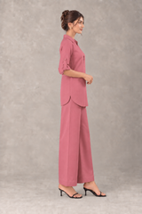 Side view of Rosa linen outfit with adjustable folded sleeves