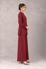 Side view of linen co-ord showing straight-cut shirt and trousers