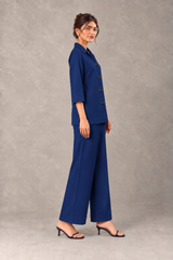 Side view of Indigo linen outfit with three-quarter sleeves